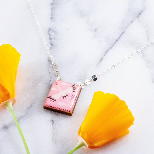 MIDCENTURY KOREAN CRANE POSTAGE STAMP NECKLACE