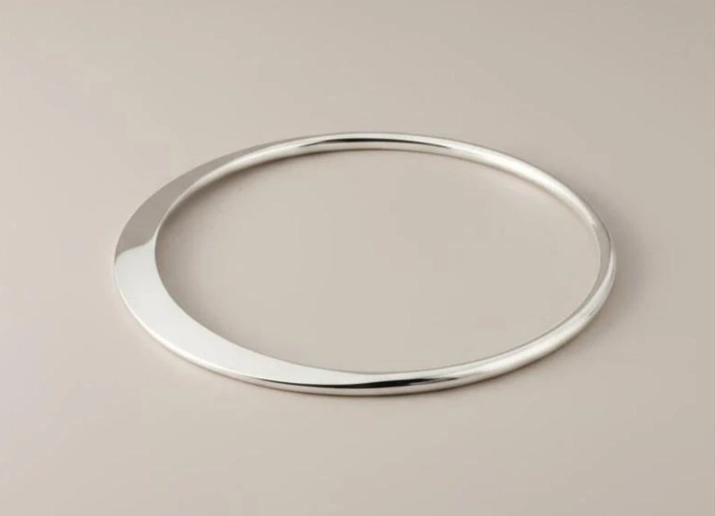 STERLING SILVER FLATTENED BANGLE