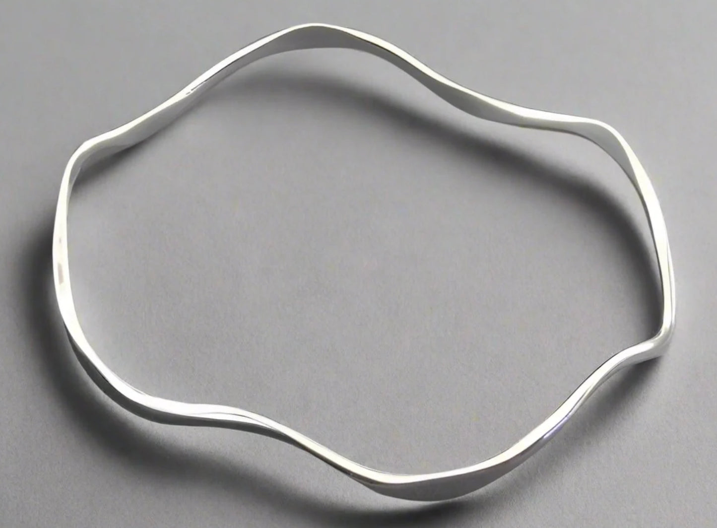 STERLING SILVER WAVY BANGLE