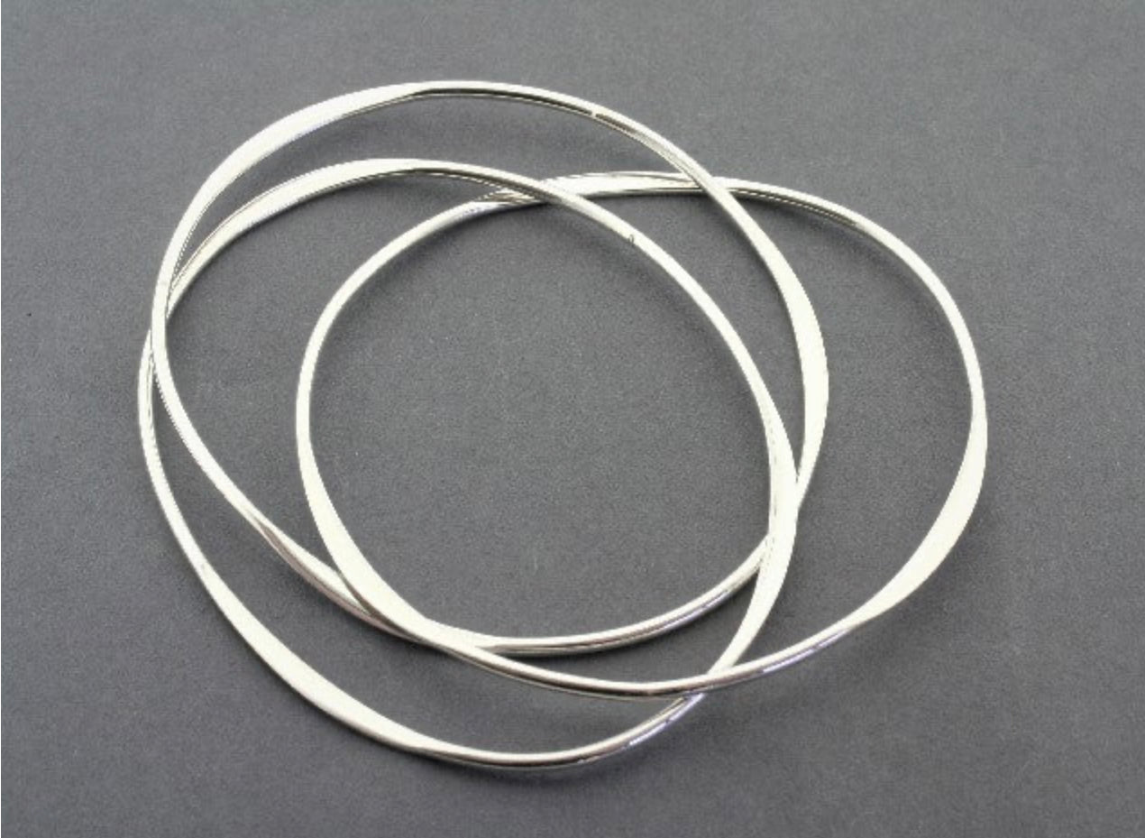 3 Interlinked Flattened Silver Bangles