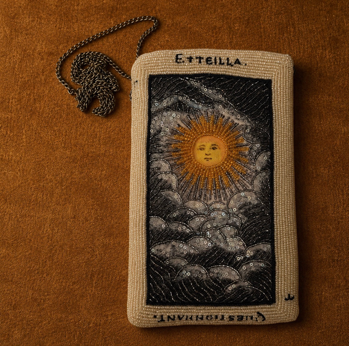 SUN CLOUD EVENING CLUTCH BAG