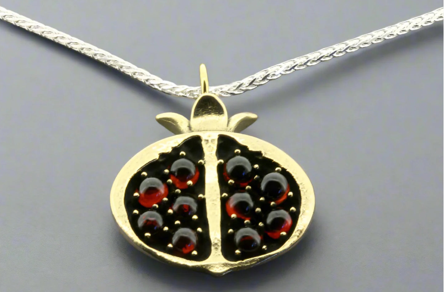POMEGRANATE PENDANT ON 55 CM SILVER CHAIN - BRASS & GARNETS