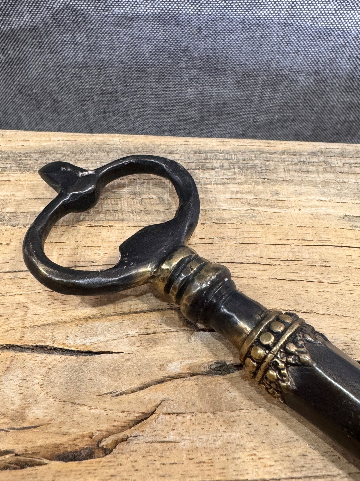 BURNISHED BRASS BOTTLE OPENER