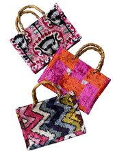 Load image into Gallery viewer, SILK IKAT VELVET TOTE WITH BAMBOOHANDLE