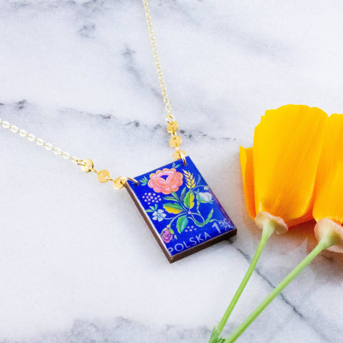 VINTAGE FLORAL POLISH STAMP NECKLACE