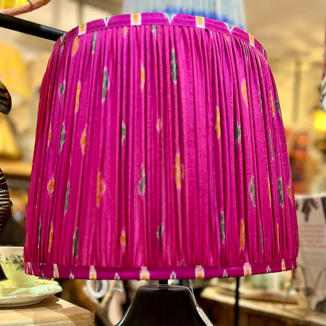 Pink tassle outlet lamp