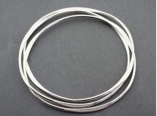3 Interlinked Flattened Silver Bangles