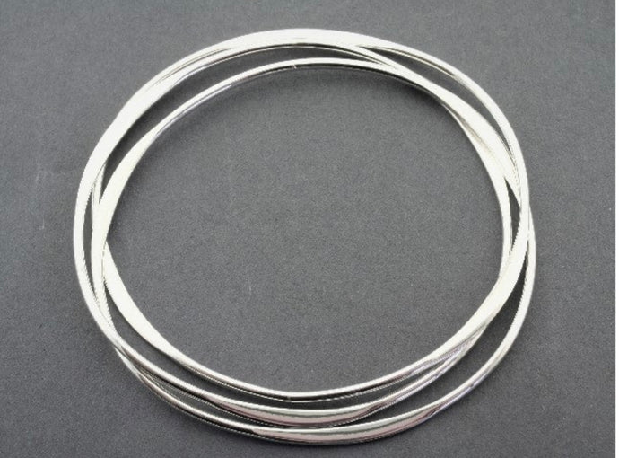 3 Interlinked Flattened Silver Bangles
