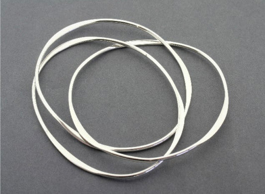 3 Interlinked Flattened Silver Bangles